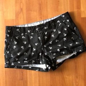Black shorts white floral pattern